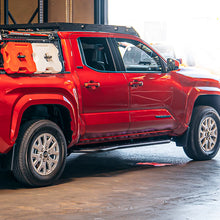 Load image into Gallery viewer, CALI RAISED STEP EDITION ROCK SLIDER FOR 2024+ TOYOTA TACOMA DBL CAB SHORT BED W/ KICK OUT & FILLER PLATE POWDERCOAT