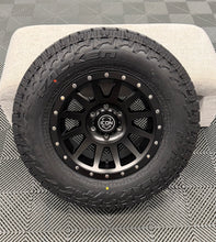 Load image into Gallery viewer, Icon Compression 17x8.5 0 Offset Matte Black Bronze Gunmetal with Falken Wildpeak AT4 265/70/17 4Runner Tacoma
