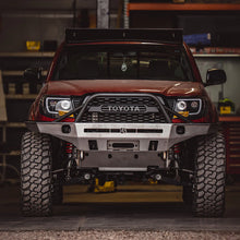Load image into Gallery viewer, C4 FABRICATION TACOMA OVERLAND SERIES FRONT BUMPER / 2ND GEN / 2005-2015 MID HEIGHT BULL BAR
